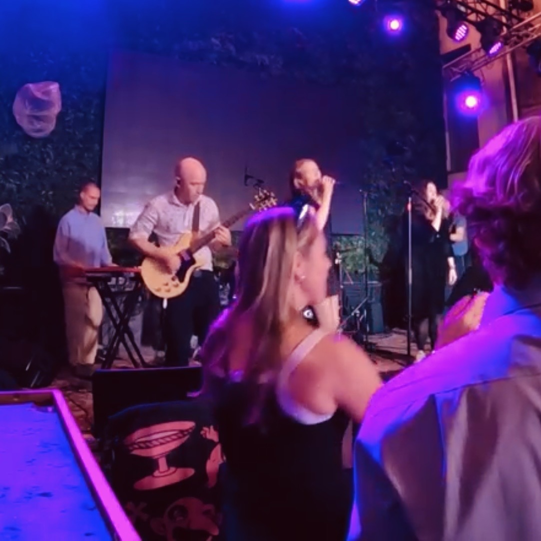 Playing guitar live with the work band